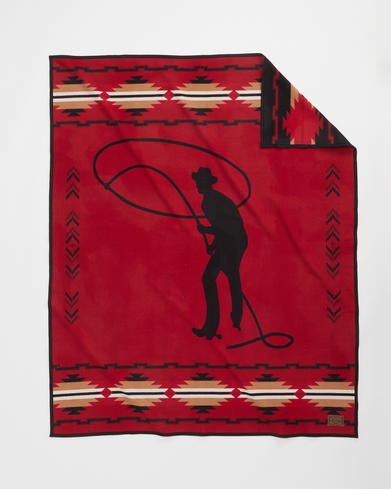 Pendleton Wrangler wool blankt, showing a man with a lariat in silhouette